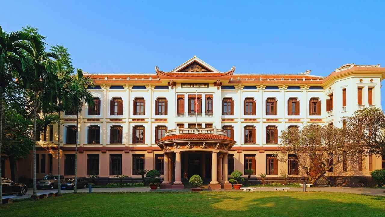 Historic French colonial building of the Vietnam National Fine Arts Museum and its lawn.