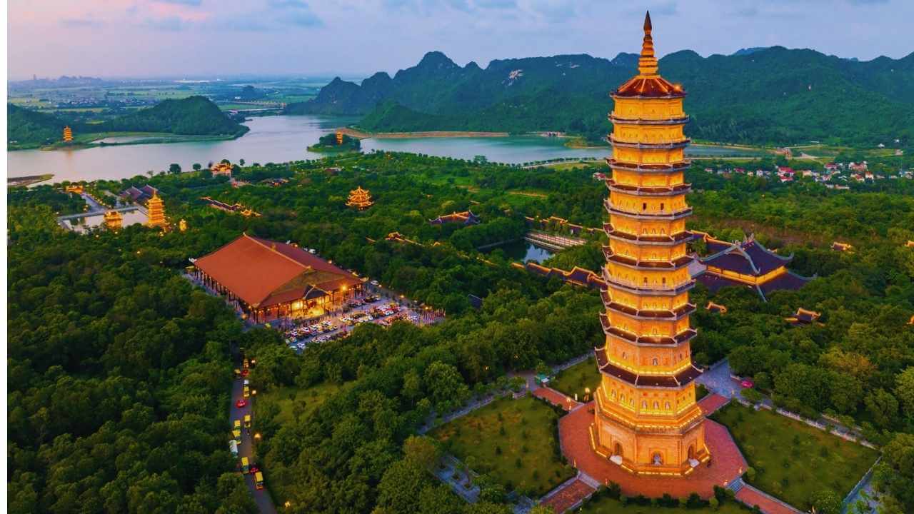 Sunset over Bai Dinh Pagoda, the largest Buddhist complex in Vietnam, nestled in Ninh Binh.