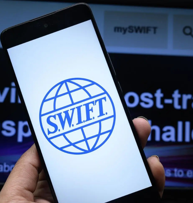 SWIFT Moves into Blockchain: Rivals Stablecoins with Institutional Ledger Plan