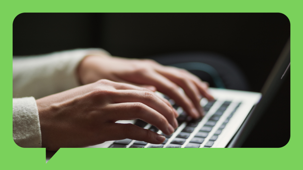 Stylized image of user typing on a computer