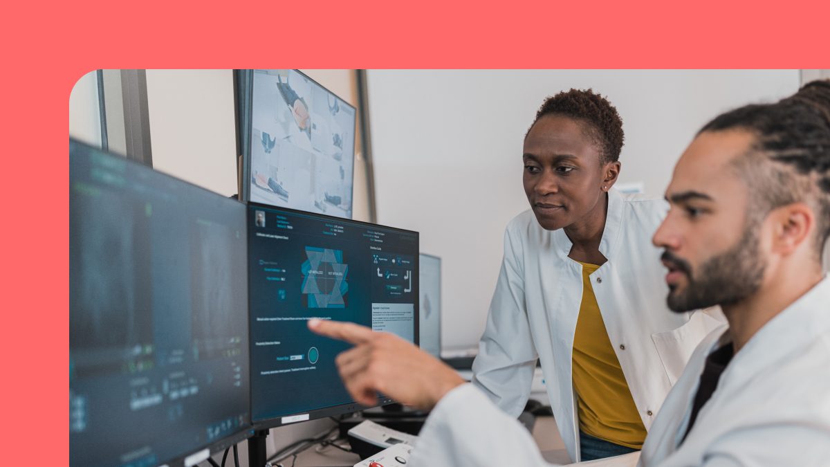 Stylized image of two medical personnel consulting data in a HealthTech application