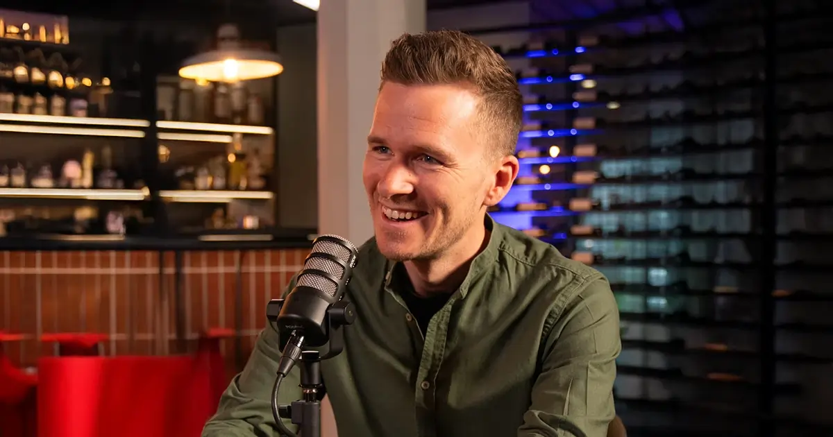 Photo of Benjamin Jaksch speaking on the podcast
