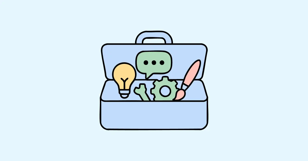 Een open gereedschapskist met daarin een gloeilamp, een tekstballon, een tandwiel, een sleutel en een penseel. De achtergrond is lichtblauw.