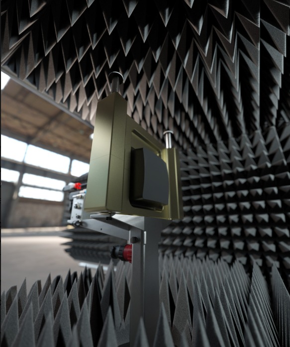Close-up of test equipment positioned inside an anechoic chamber with RF-absorbing foam pyramid panels