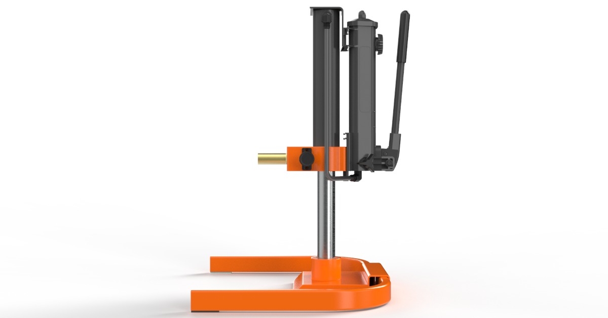 Side view of an orange and black portable lifting device with a vertical metal column, hand-operated lever, and U-shaped base.