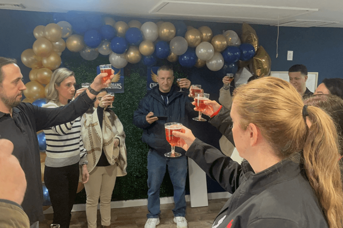 Tram at Guardians of the States performing a toast