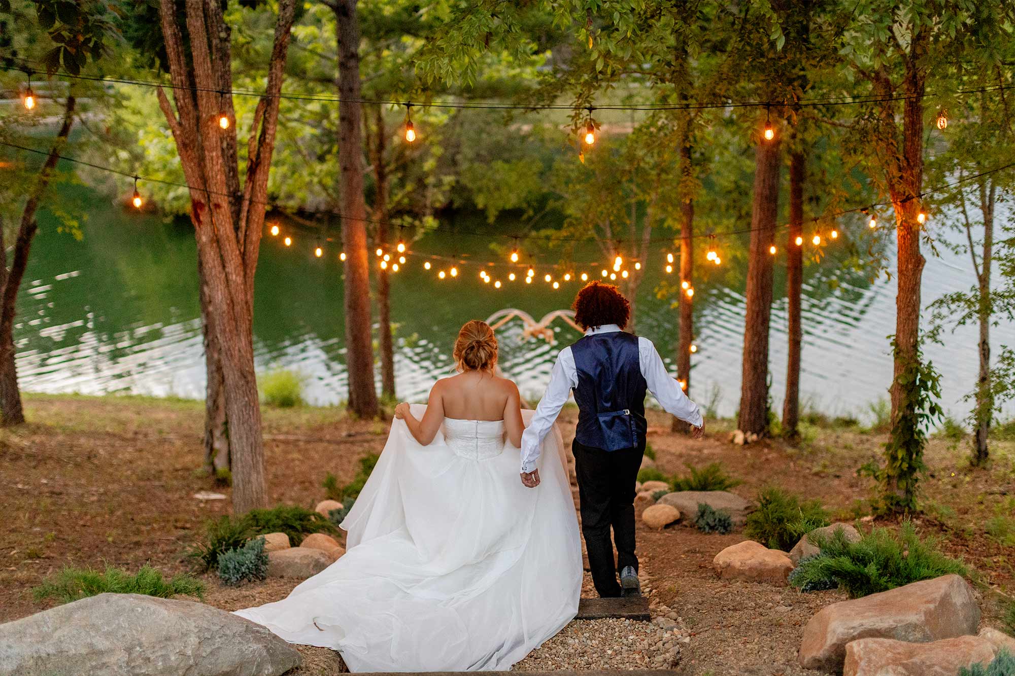 A couple walking towards a river in the Smoky Mountains