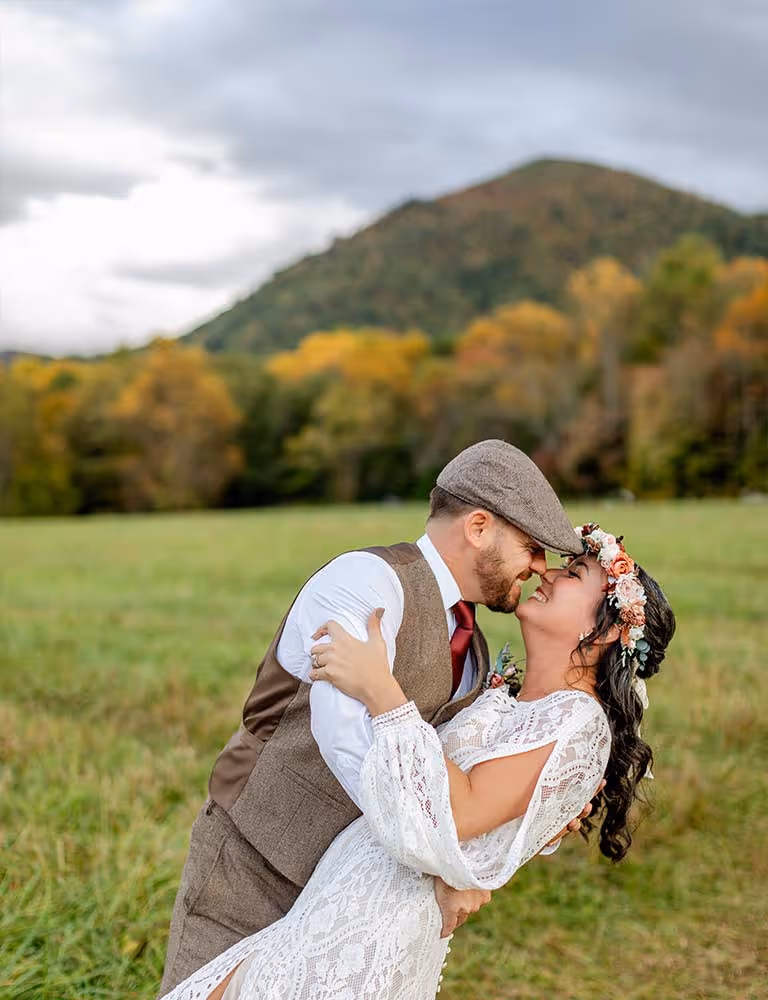 A couple kissing in Cades Cove in Tennessee.