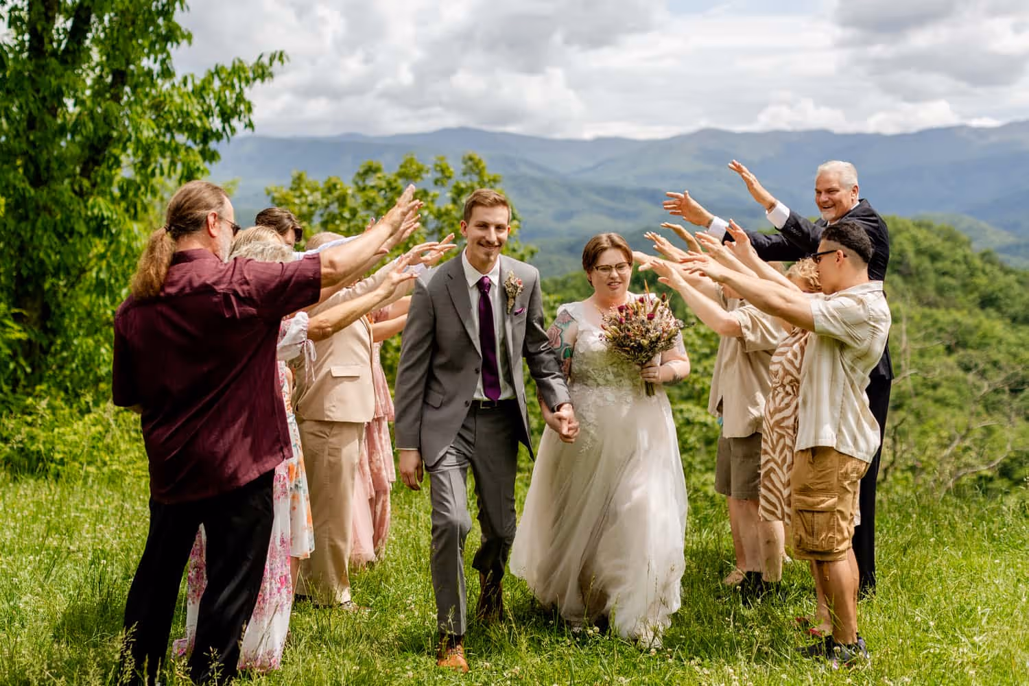 A couple who eloped in Foothills parkway surrounded by friends and family.