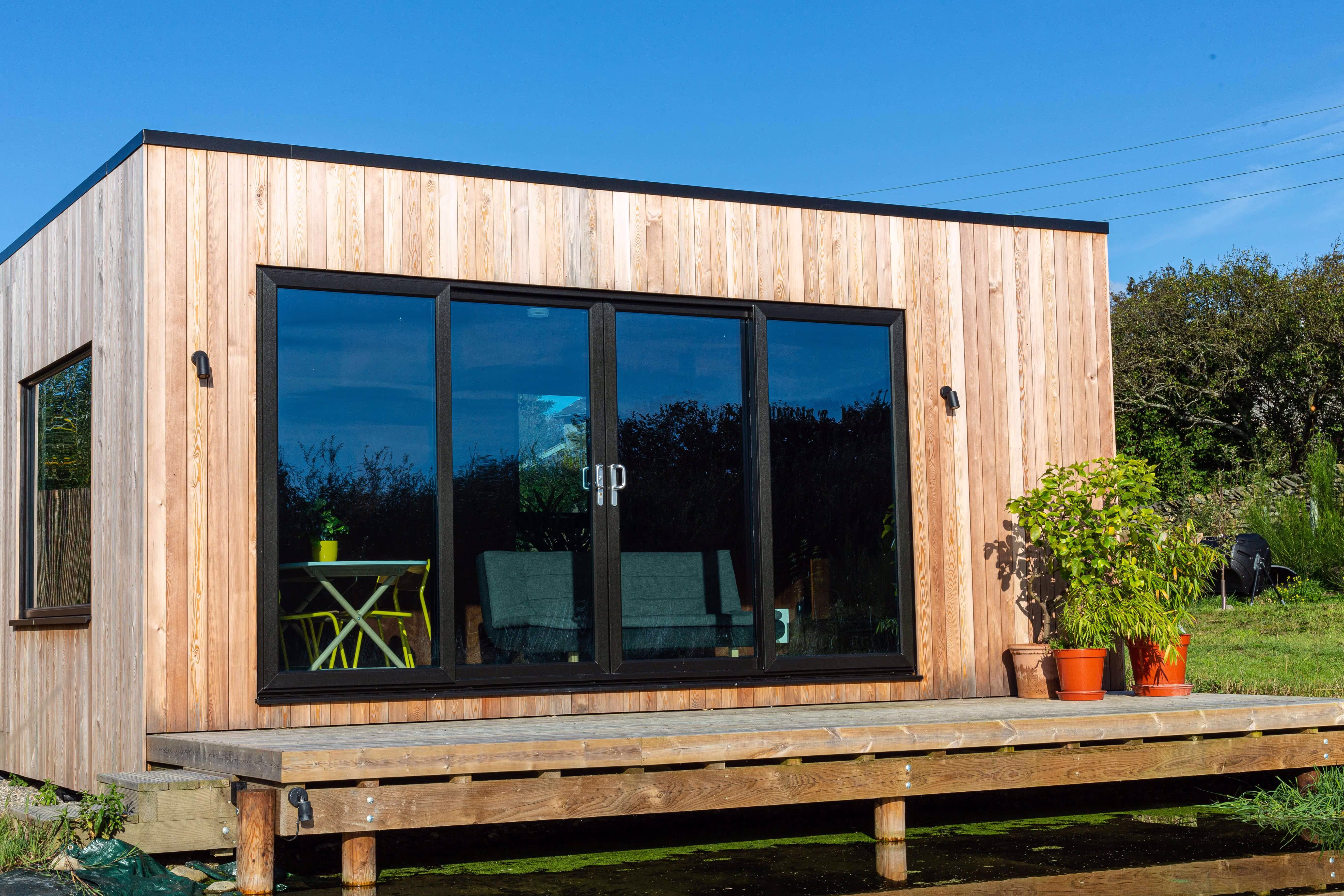 Bespoke insulated cedar clad garden room in Cartmel, Cumbria by Garden Room Design Cumbria