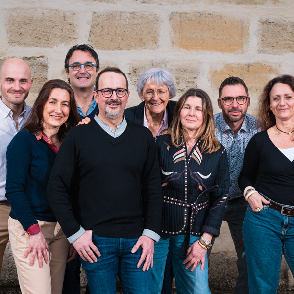 Group portrait of the oenologist team from EVV, an oenology consulting firm based in Bordeaux.