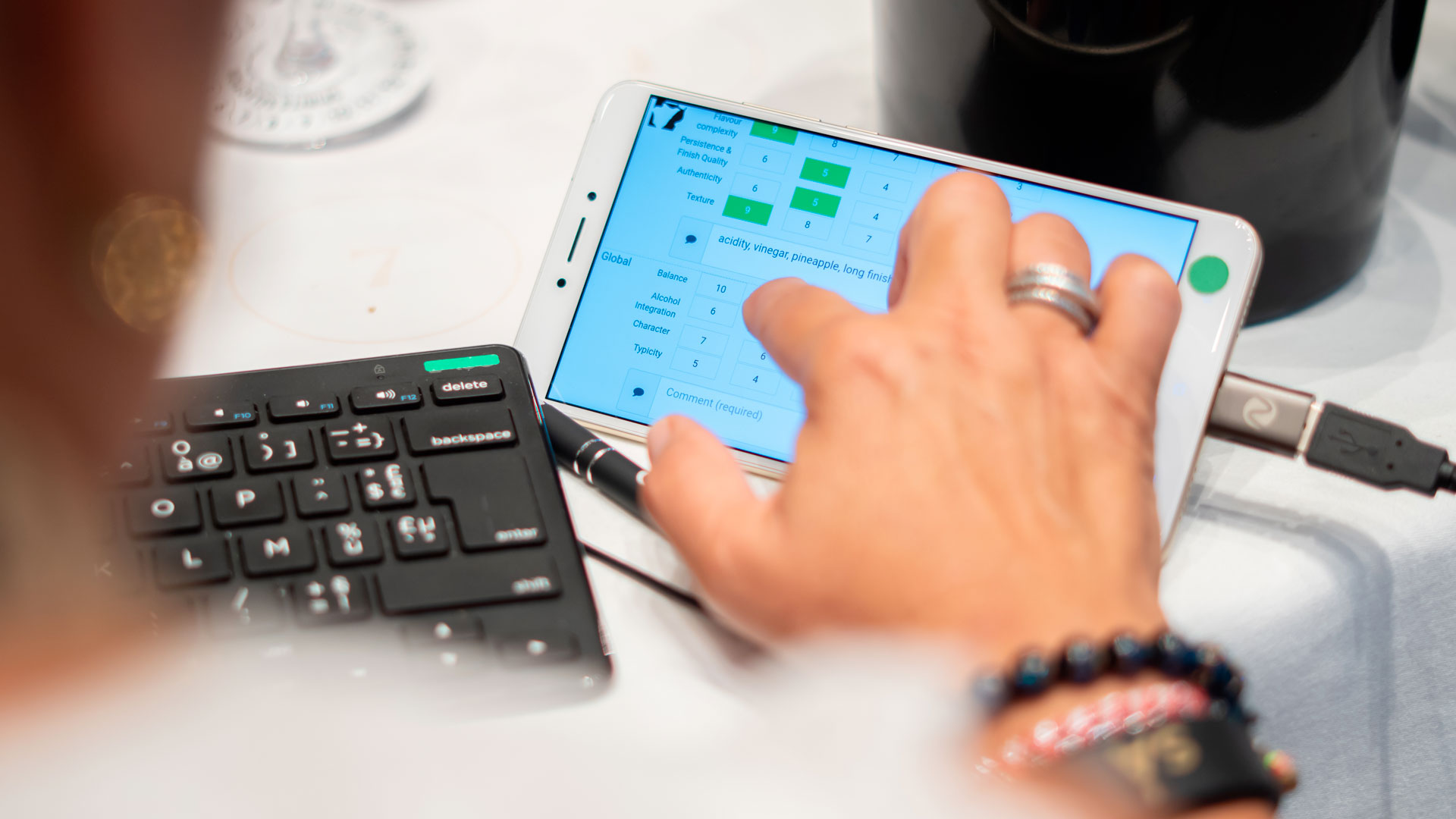 Focus on the digital tasting interface used by judges at Spirits Selection 2025 to evaluate and score spirits during blind tastings.