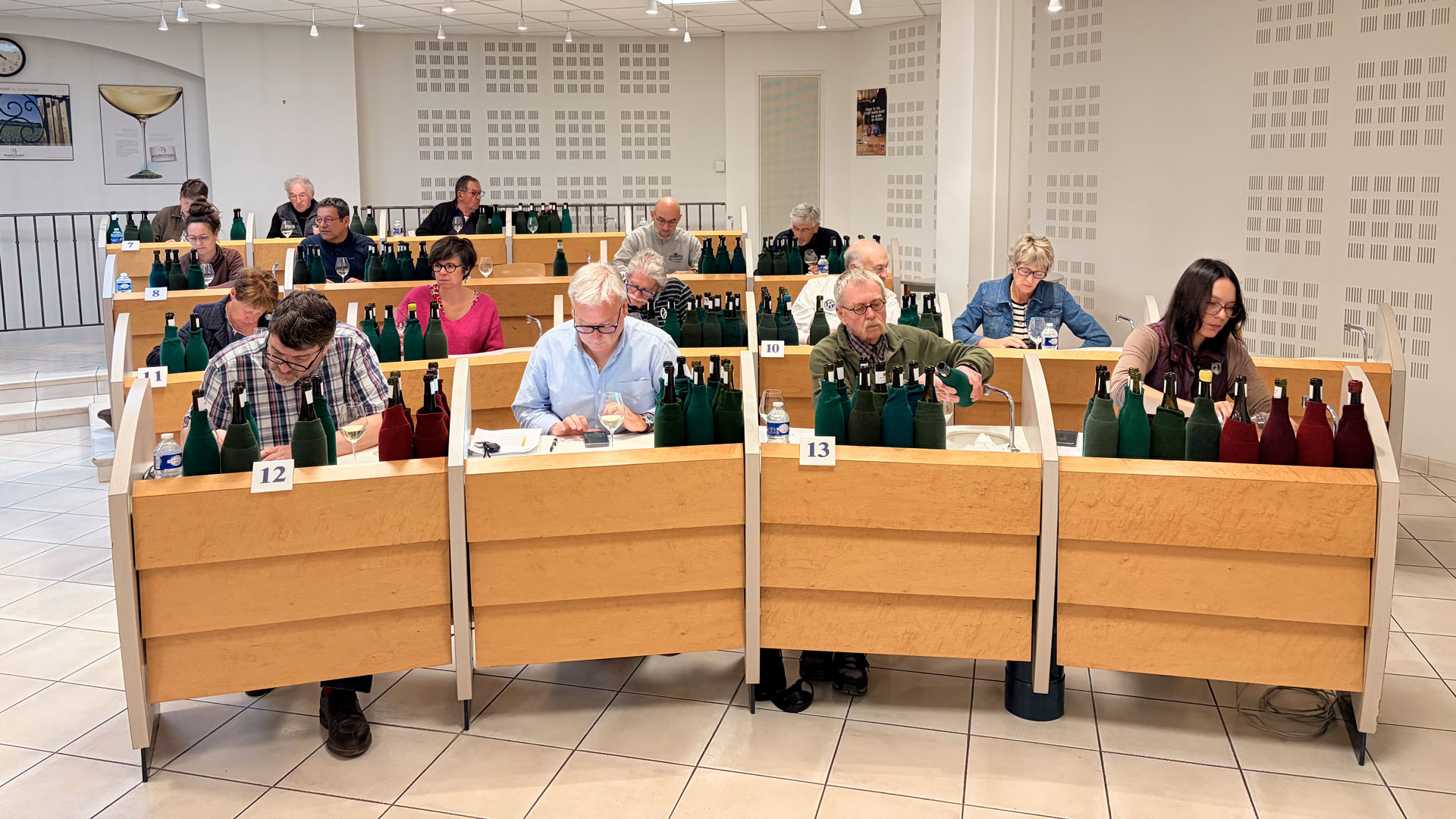Jury members of the BIVB Cave de Prestige evaluating wines blind in the Beaune tasting room