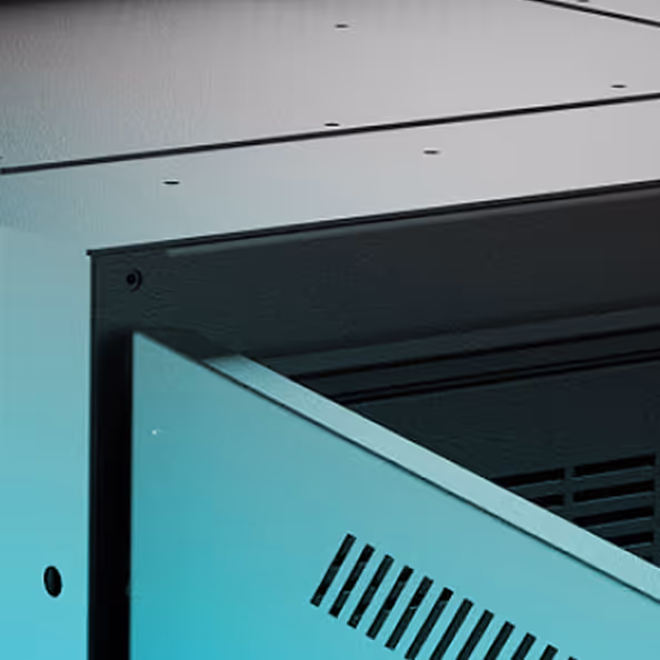 A black and silver computer with a blue background. - Forgent Images