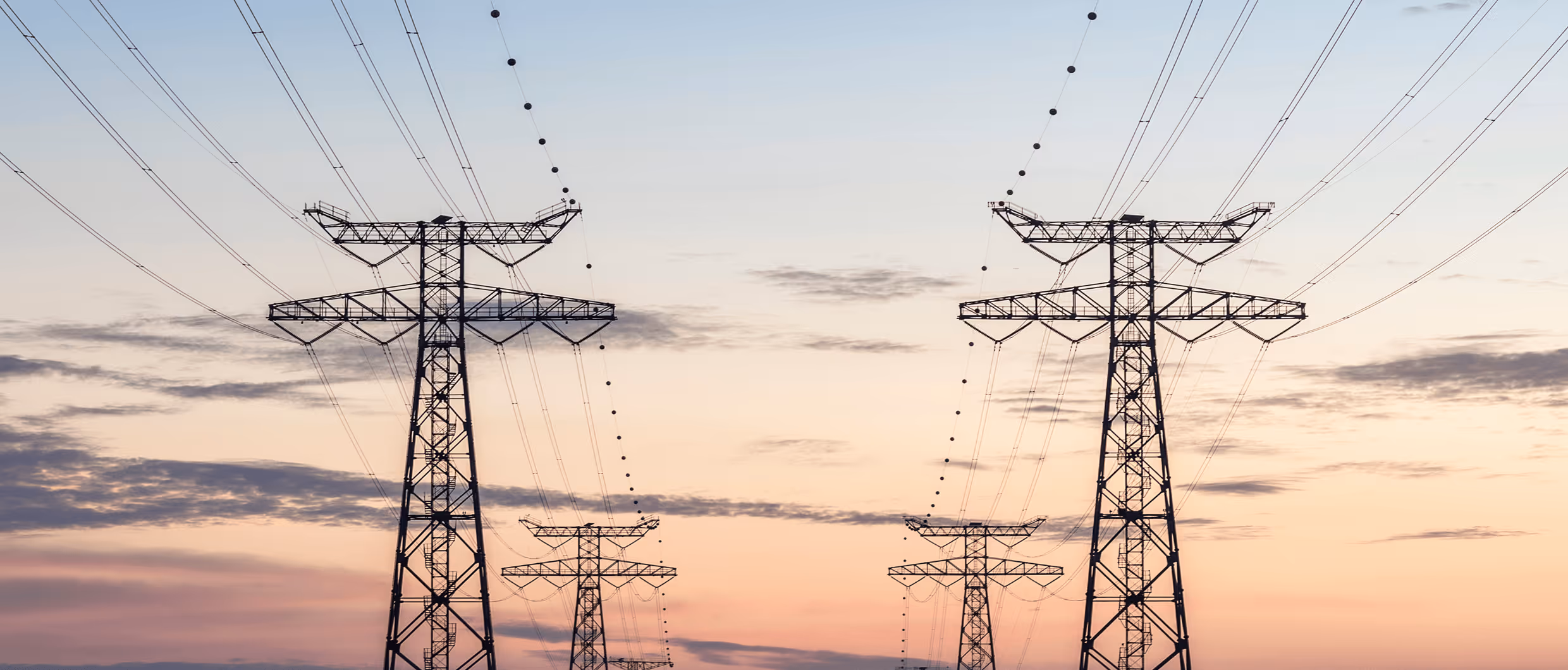 A power line with many wires and poles. - Forgent Images