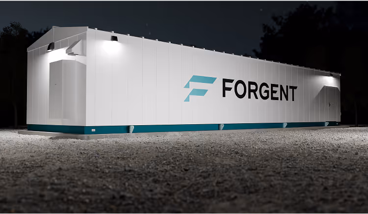 A large white building with a blue logo on it.