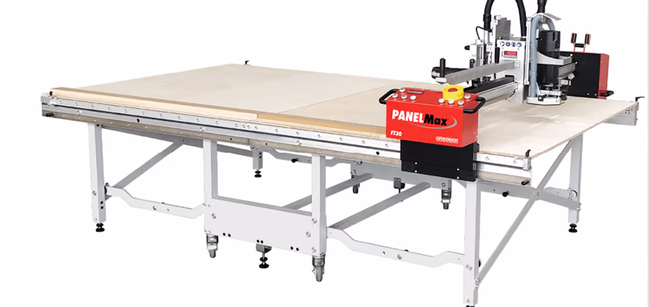 PanelMax FT30 CNC router machine with a large flat work surface and red control box.