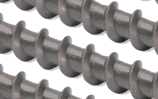 Close-up of multiple gray metal auger drill bits with spiral flutes on a white background.
