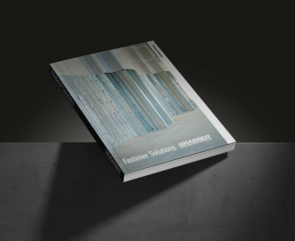 Interior construction site with metal wall studs and partially installed drywall panels.