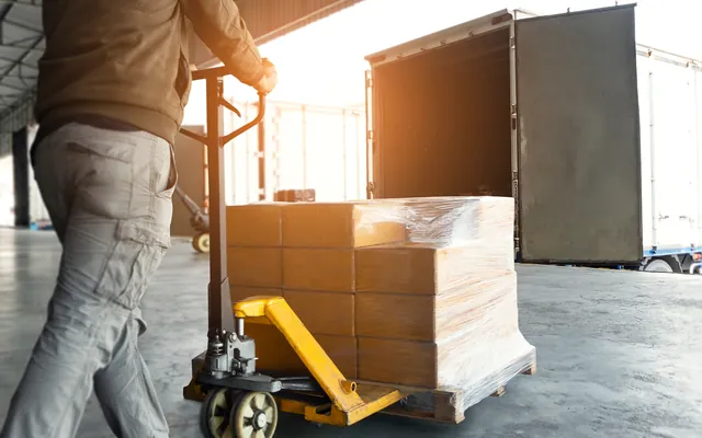 Pallet of supplies being delivered from a truck