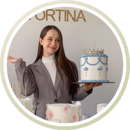 female pastry chef with cakes