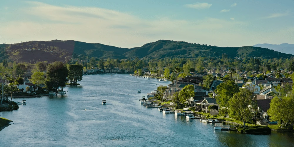 Lake‑front native plants and hillside views in Westlake Village, California