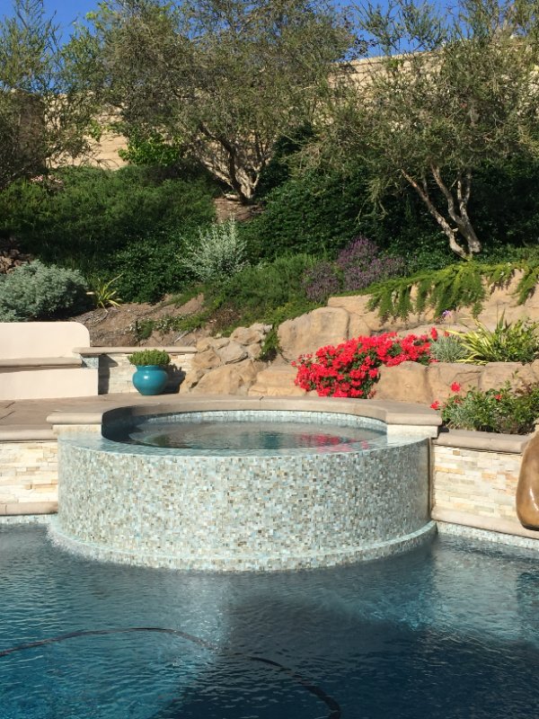 Custom Backyard Jacuzzi and Pool Installation by Jessie Flores Landscape Co. in Thousand Oaks, CA