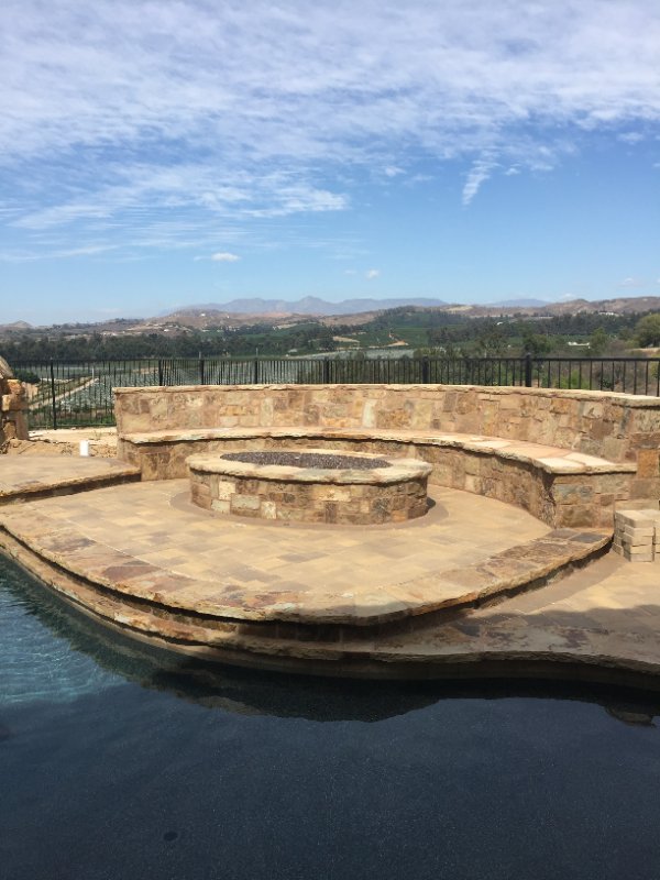 Elevated Pool with Natural Stone Hardscaping and Scenic Views by Jessie Flores Landscape Co. in Thousand Oaks, CA