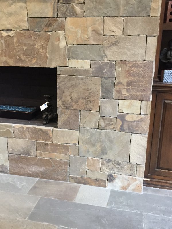 Custom Stone Outdoor Fireplace Installation by Jessie Flores Landscape Co. in Thousand Oaks, CA
