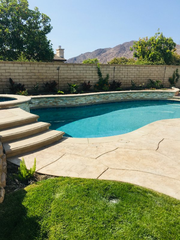 Custom Pool with Natural Stone Work by Jessie Flores Landscape Co. in Thousand Oaks, CA