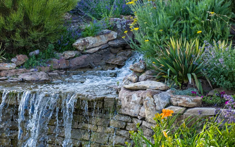 Custom backyard waterfall and pond water feature in Thousand Oaks by Jessie Flores Landscape Co.