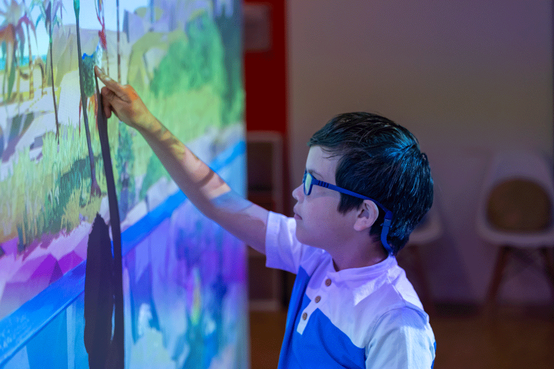child at art zone screen interactive