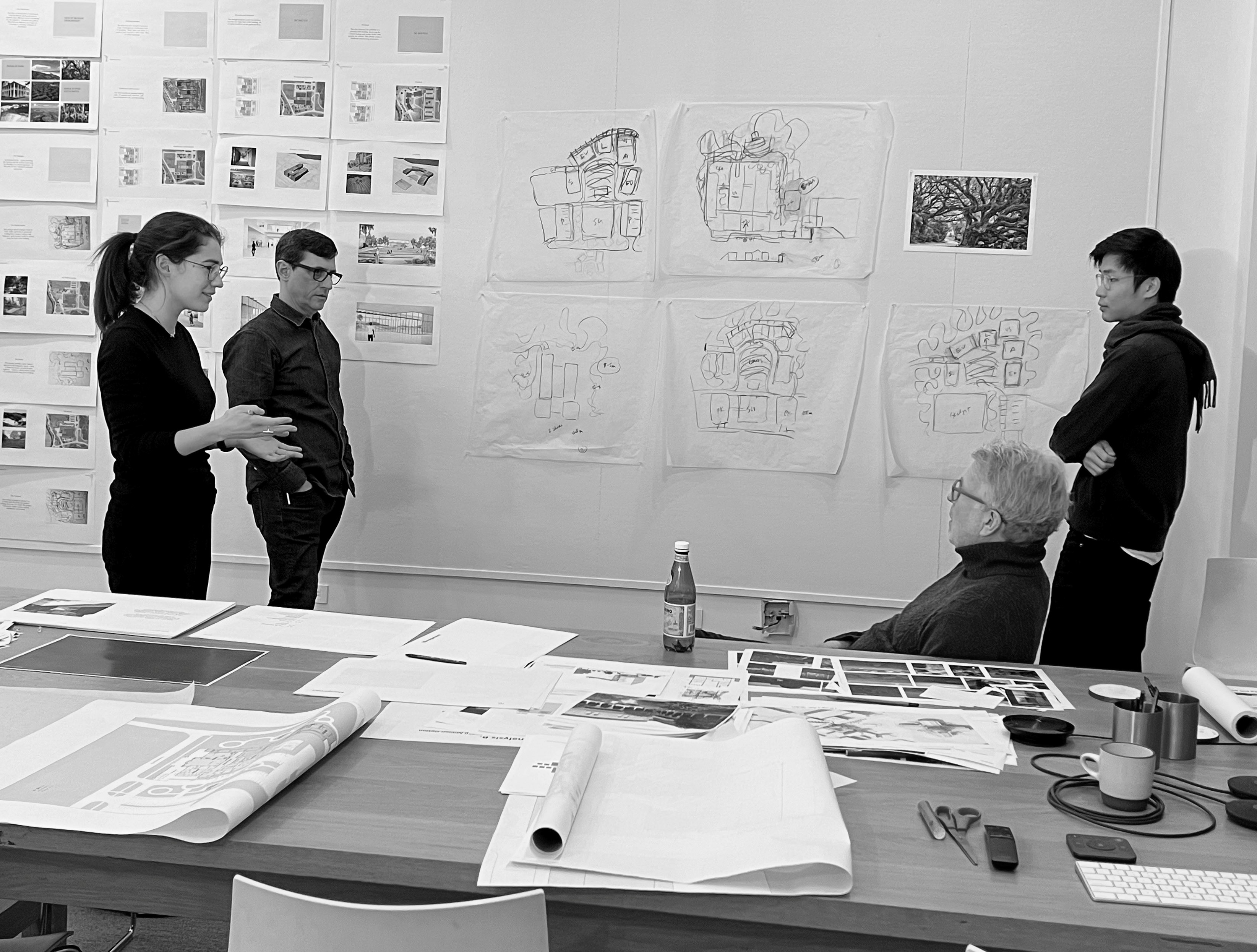 Architects discussing the project in the Allied Works studio