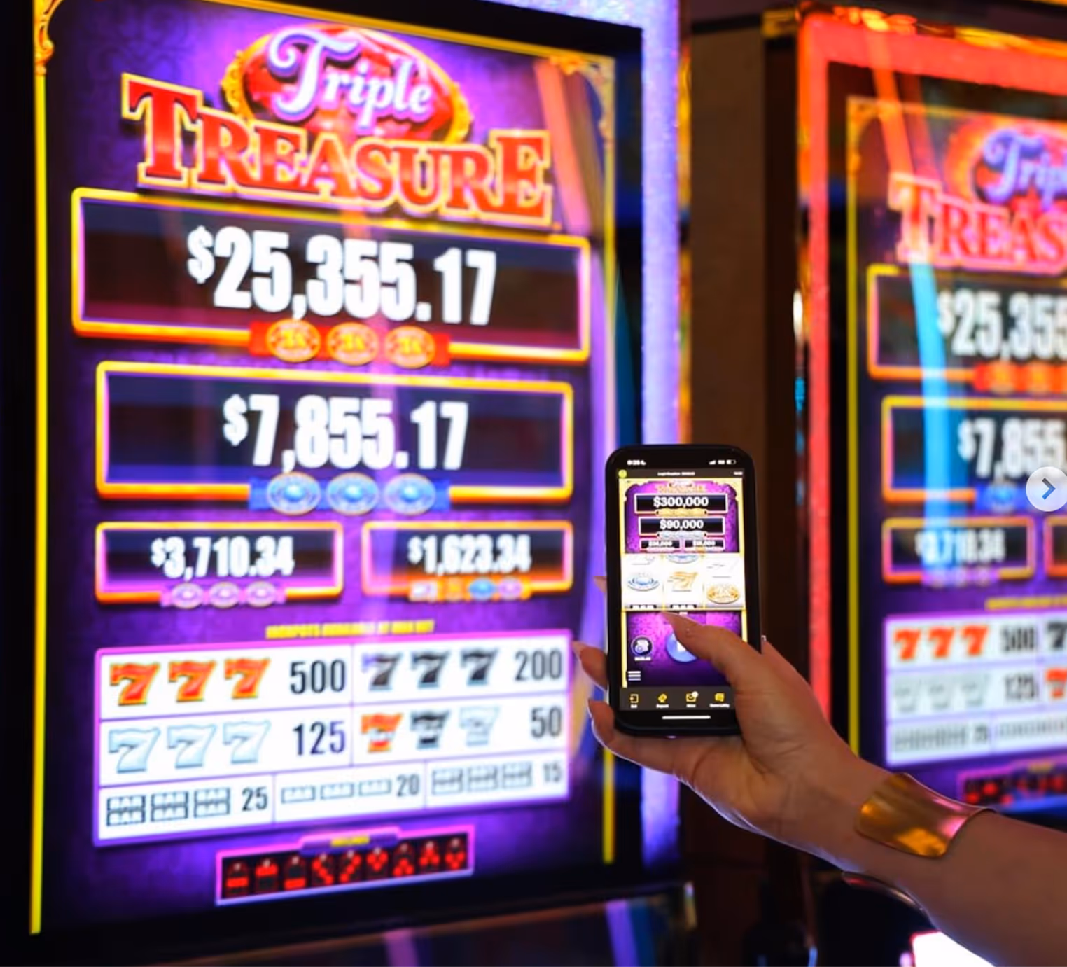 Triple Treasure slot machine with progressive jackpot and mobile app display