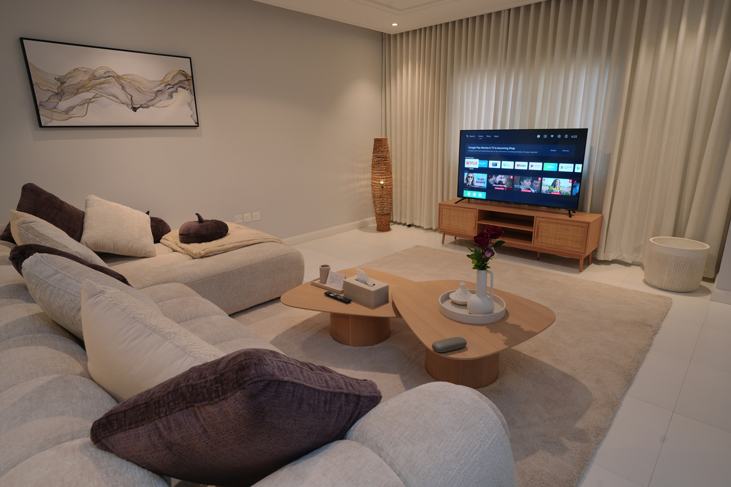Modern furnished living room with smart TV in staff housing at Creative Hospitality Compound in Saudi Arabia