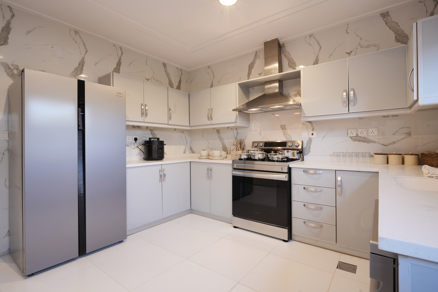 Modern fully equipped kitchen in staff housing at Creative Hospitality Compound in Saudi Arabia