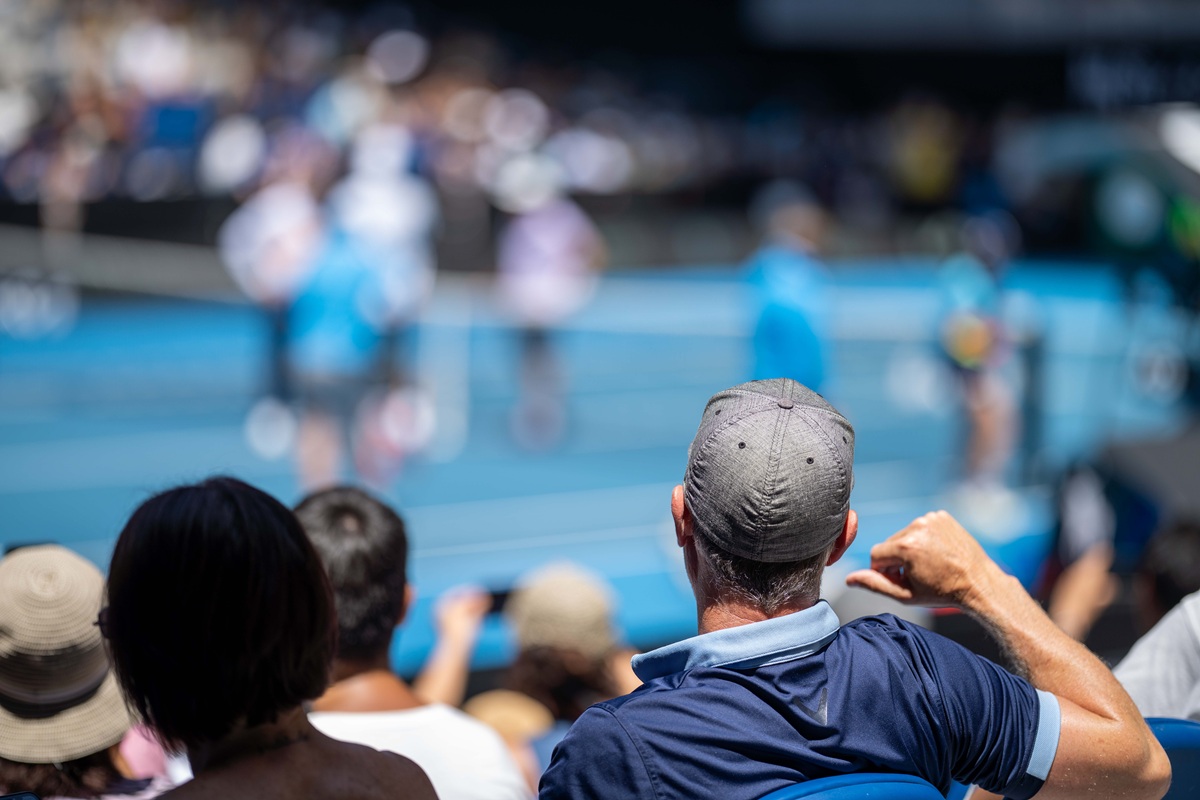 Watching tennis game at the stadium