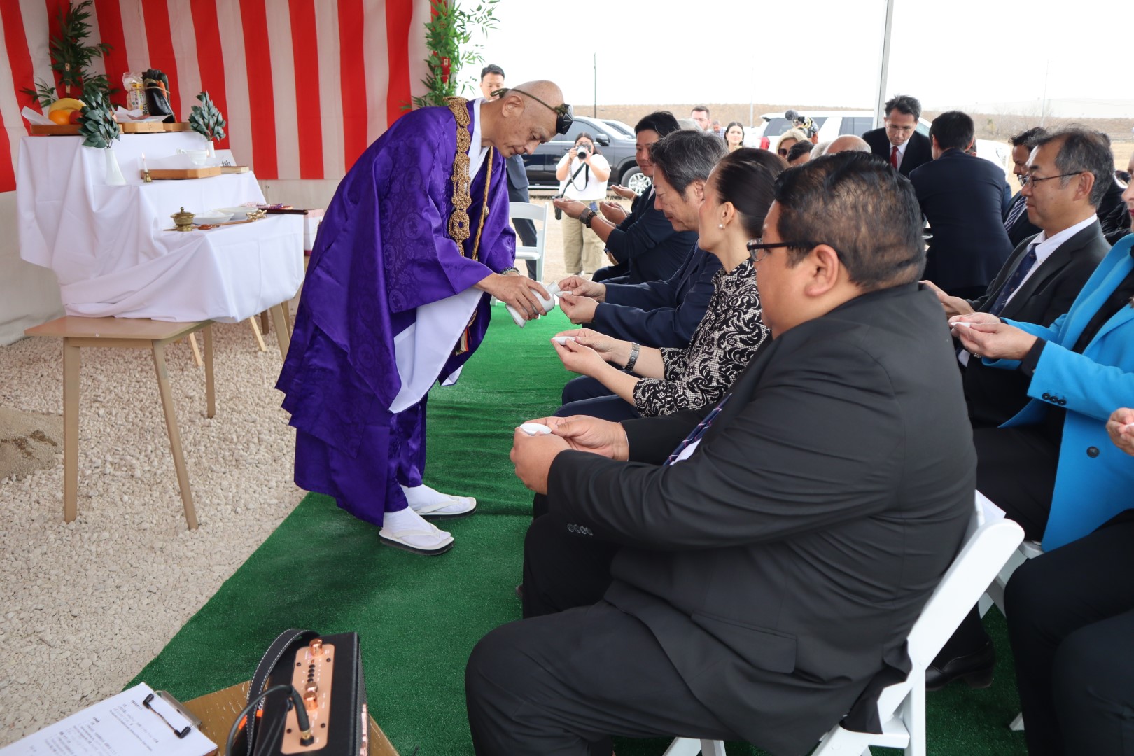 Participants attending a traditional Japanese Jichinsai ceremony in Texas