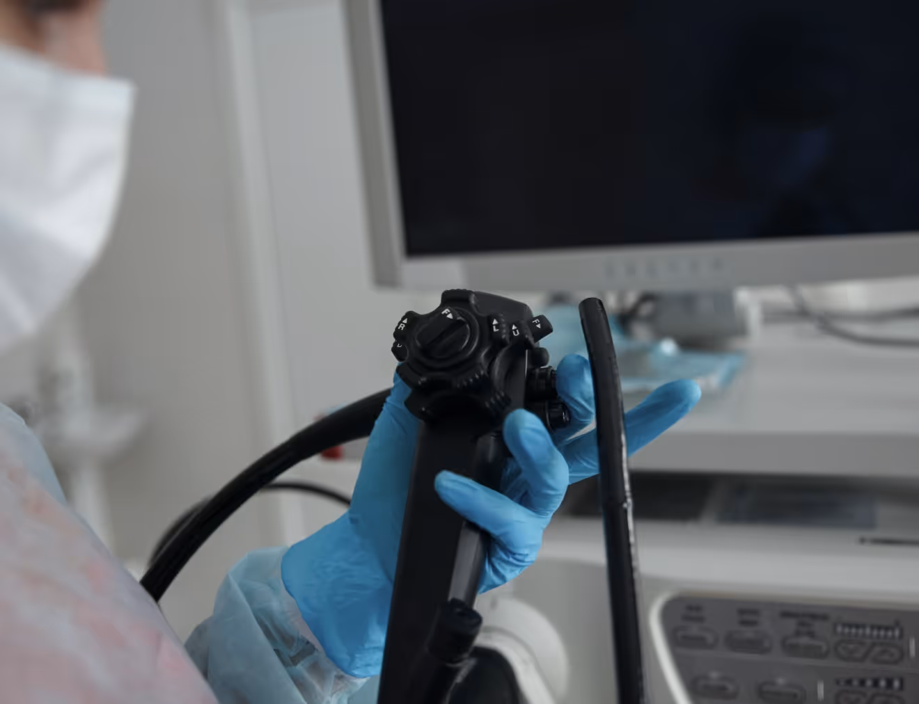 Nurse cleaning tool for colonoscopy, screening to investigate symptoms in Beverly Hills