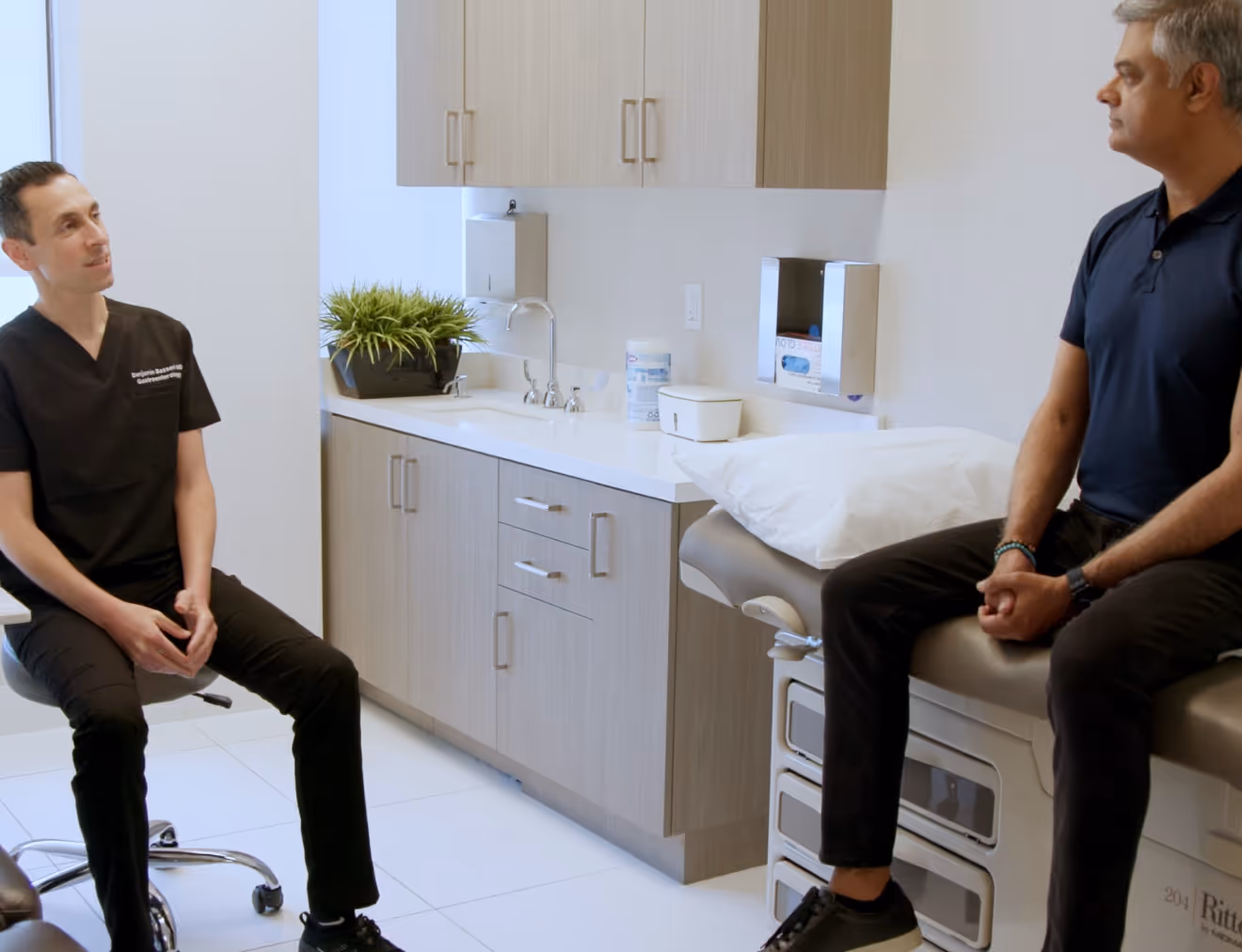 Man in Beverly Hills getting discreet, non-surgical treatments for hemorrhoid relief