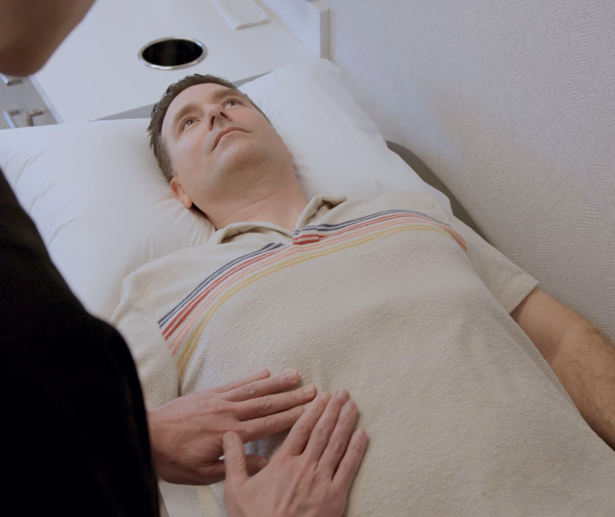 Man in Los Angeles undergoing advanced imaging and lab work to determine root cause of abdominal pain.