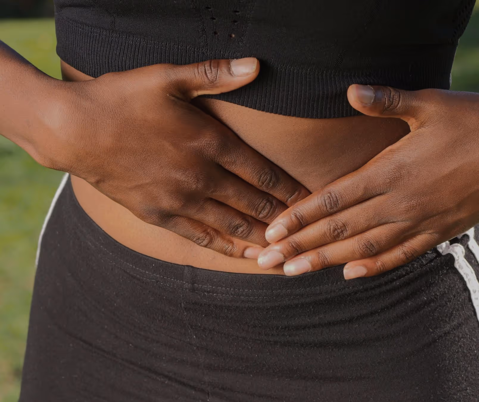 Los Angeles woman exploring diagnosis of abdominal pain and treatment options with compassionate care.