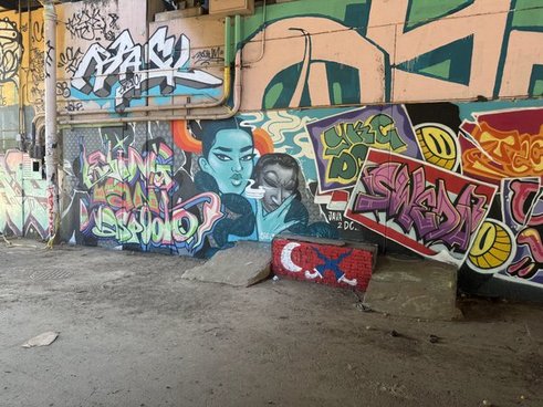 Artists using the Bridge Spot "open wall" as a rotating canvas