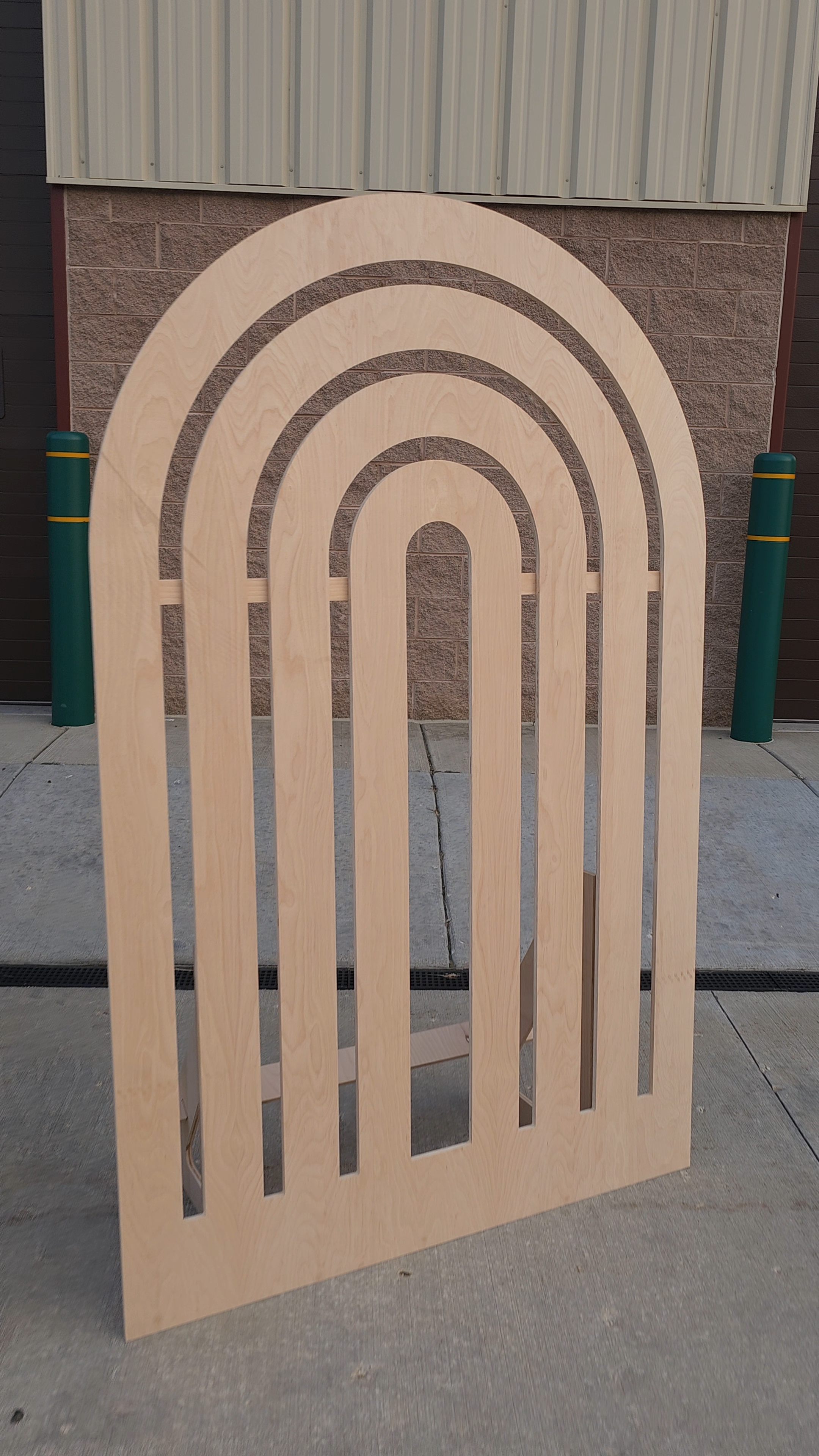 Wooden rainbow arch photo backdrop