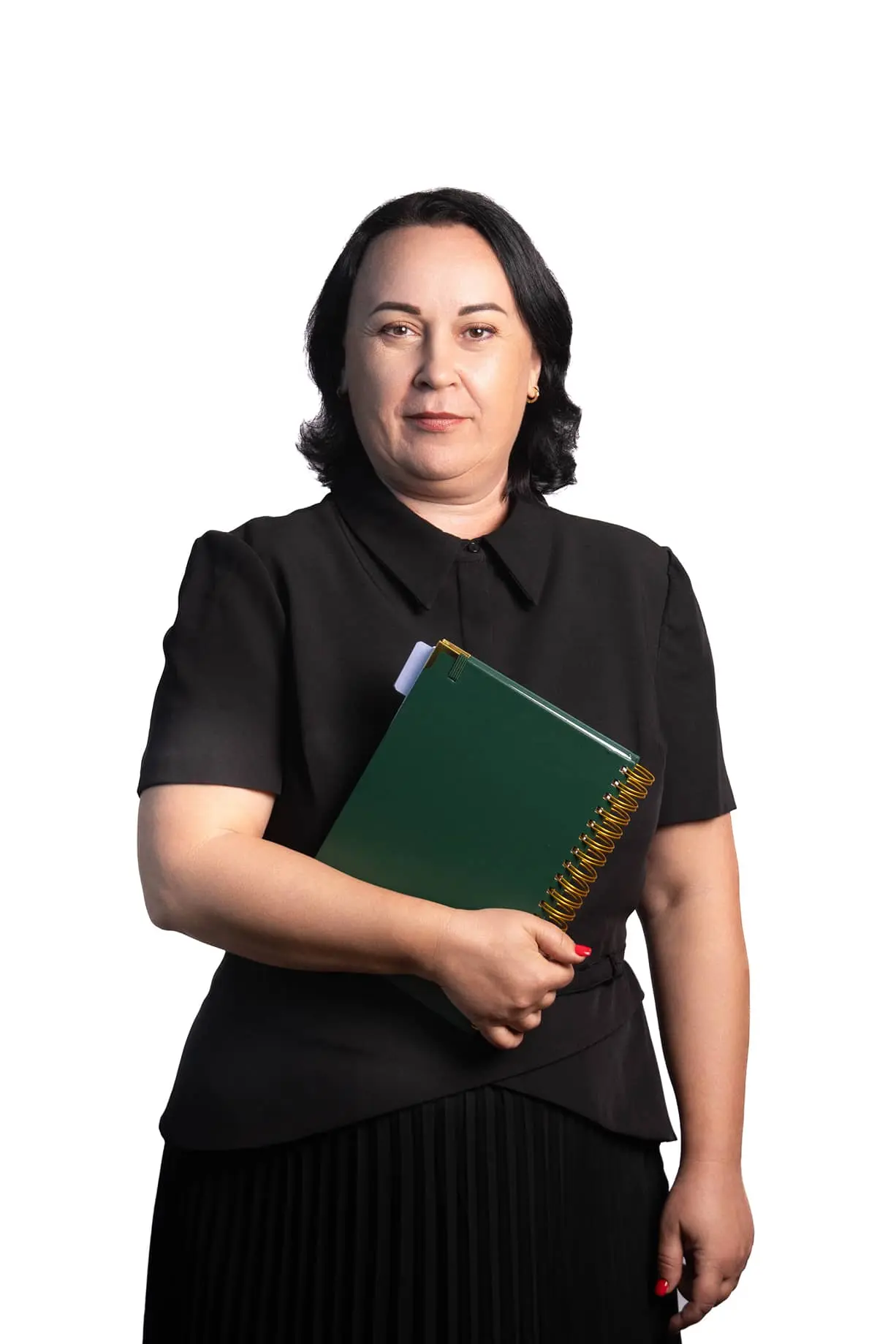 a woman in a black shirt holding a green binder