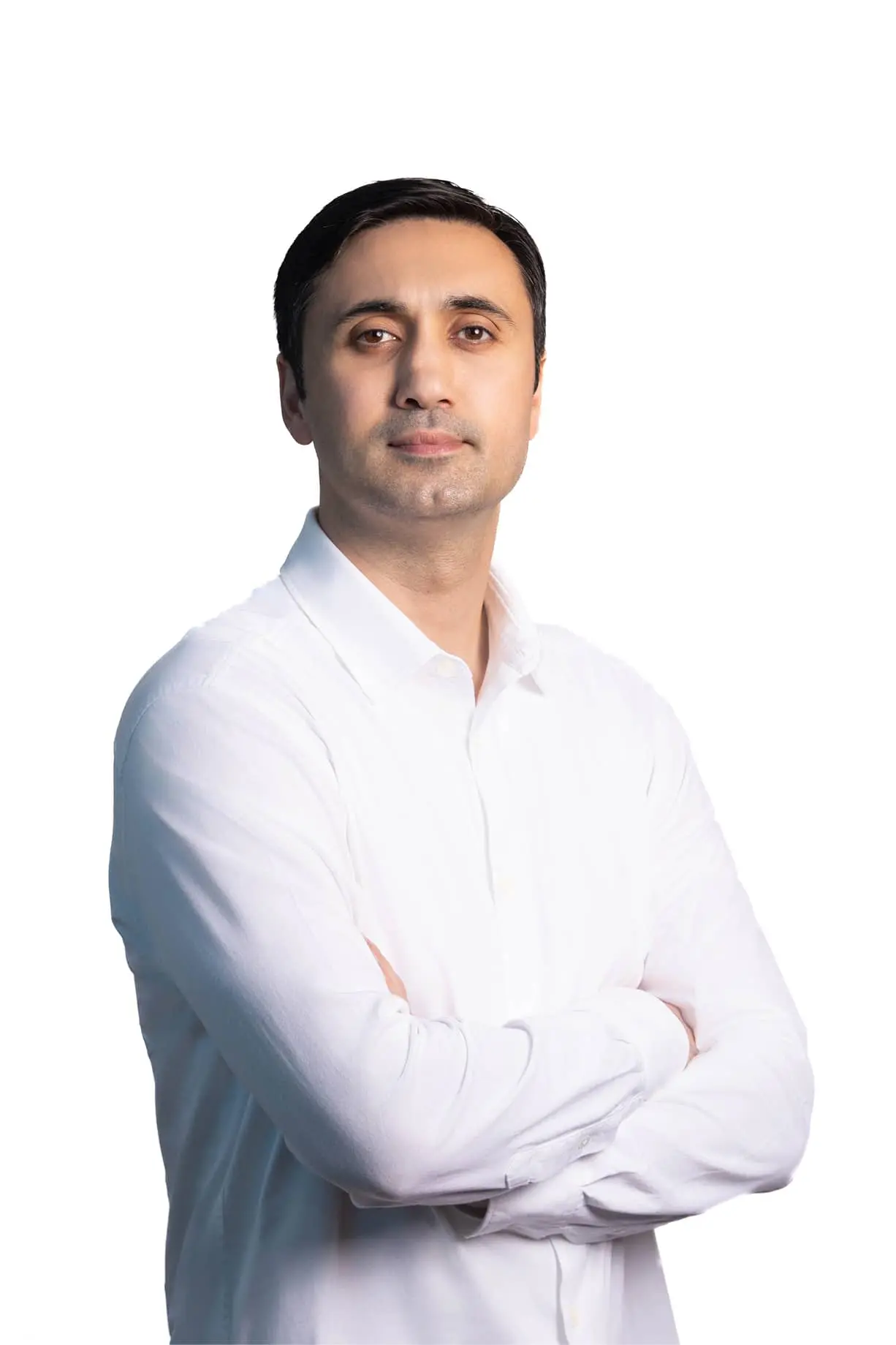 a man in a white shirt posing for a picture