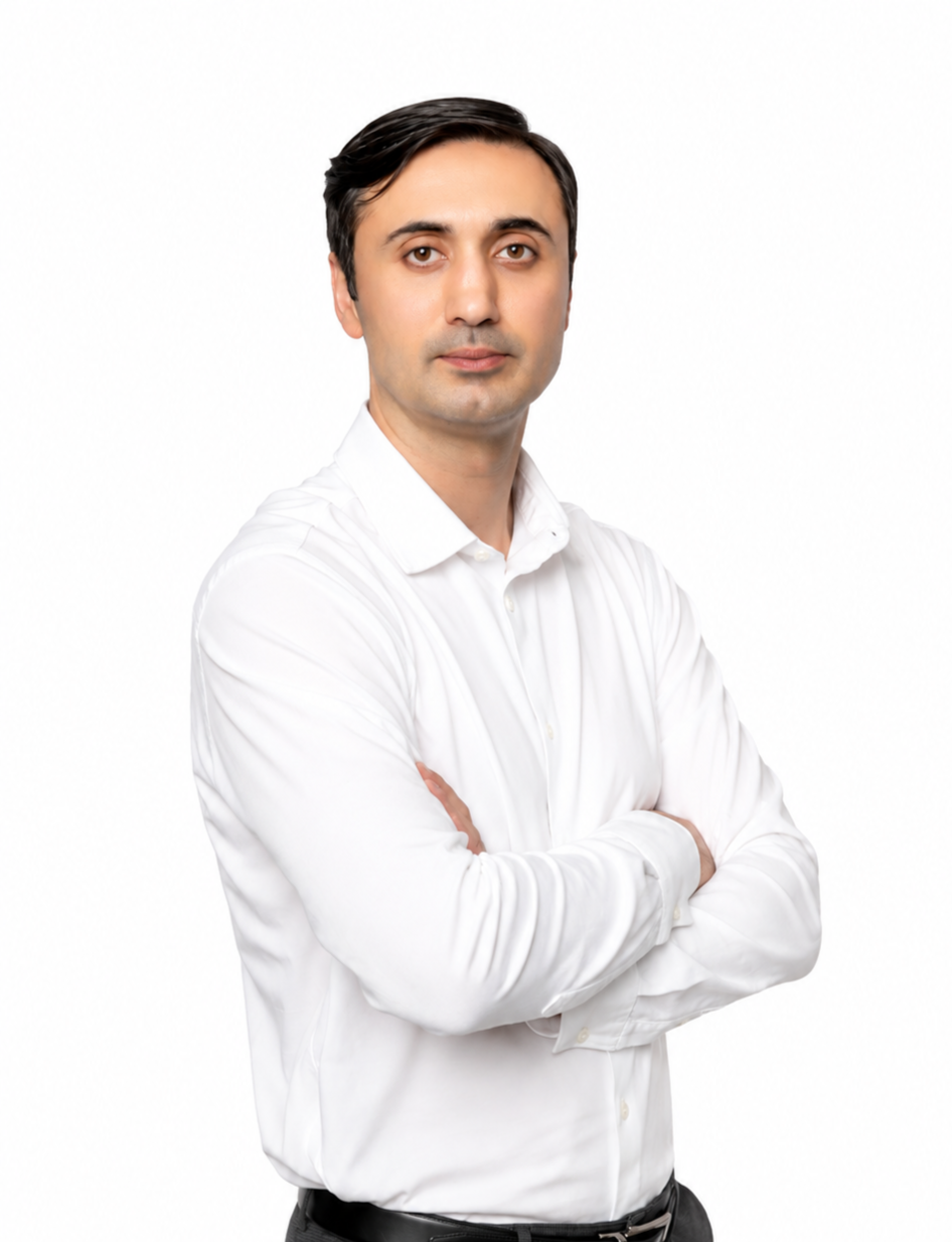 a man in a white shirt posing for a picture