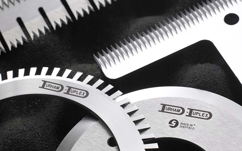 Four packaging knives manufactured by Durham Duplex to showcase their products.