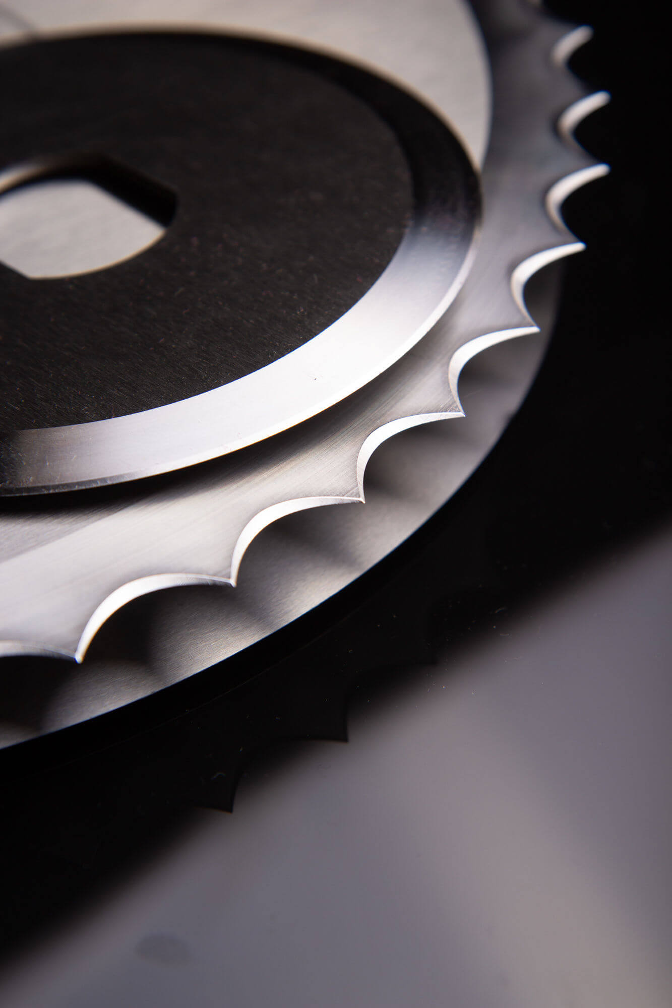 Poultry processing scalloped and circular blades manufactured by Durham Duplex.