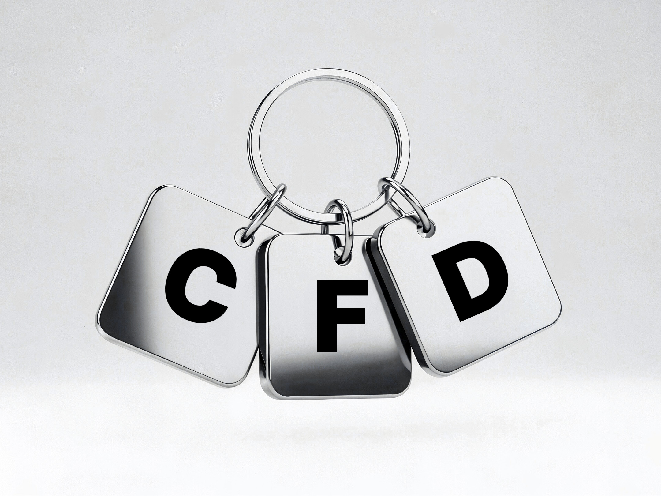 CFD letters on a keychain representing the first steps to start trading CFDs on Deriv in the UAE for new and aspiring traders.